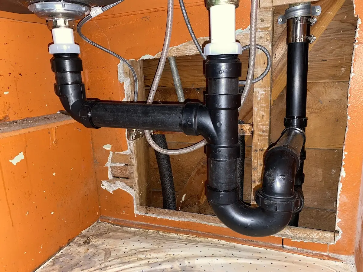 Professional Garbage Disposal Repair equipment and tools on the job in Winterville